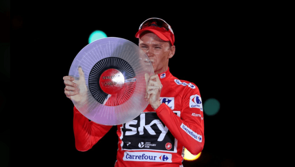  Team Sky rider Chris Froome of Britain celebrates on the podium after winning the Vuelta Tour of Spain.