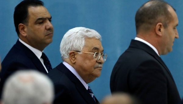 Palestinian President Mahmoud Abbas walks out after a news conference with Bulgarian President Radev in Ramallah, in the West Bank March 22, 2018.