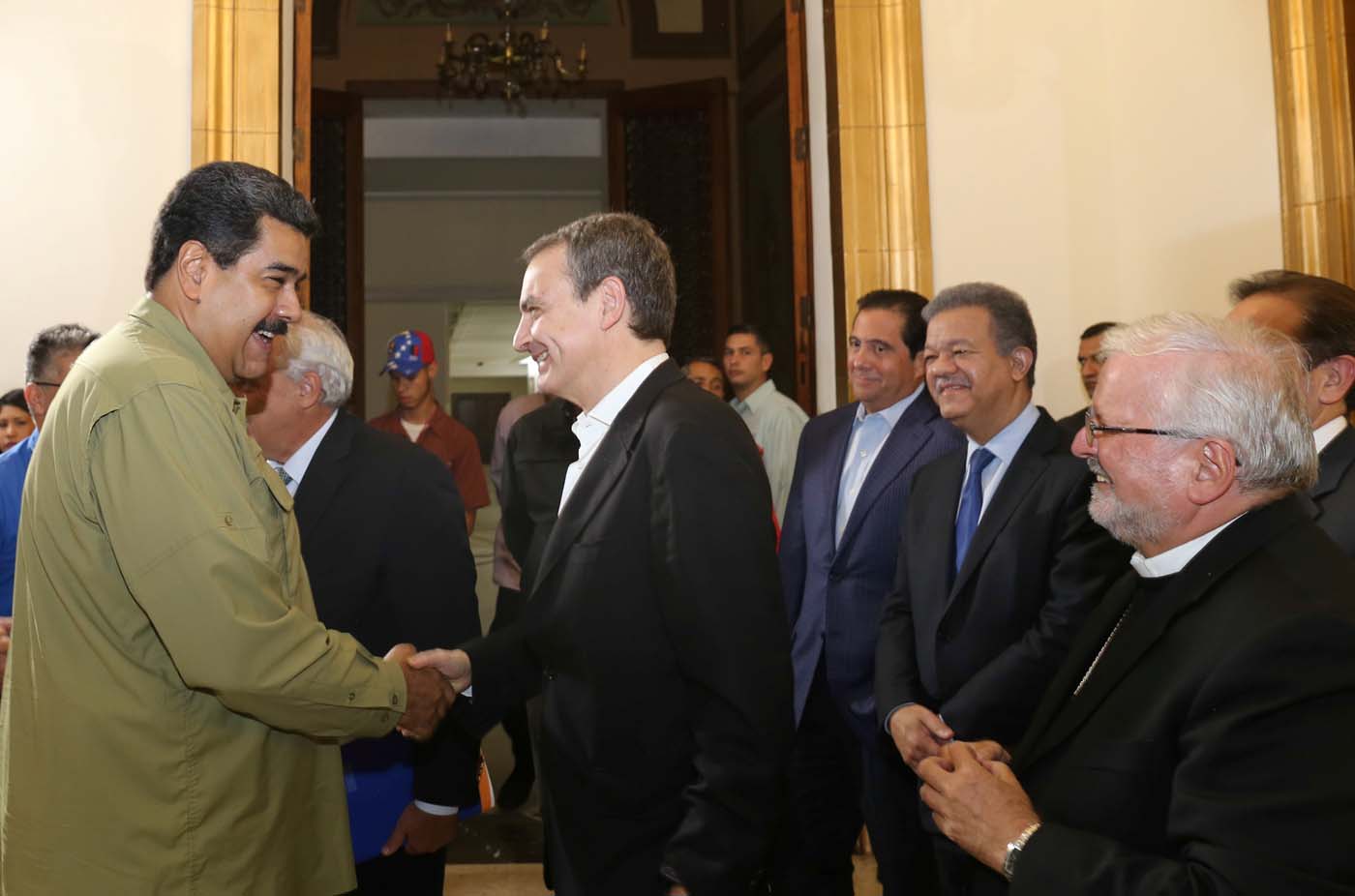 Venezuela's President Nicolas Maduro (L) and former Spanish prime minister Jose Luis Rodriguez Zapatero
