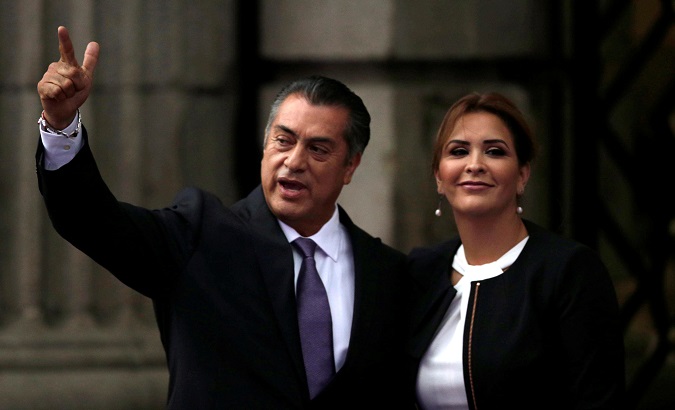 Independent presidential candidate Jaime Rodriguez and his wife Adeline Davalos gesture after arriving at Palacio de Mineria for the first presidential debate in Mexico City, Mexico April 22, 2018.