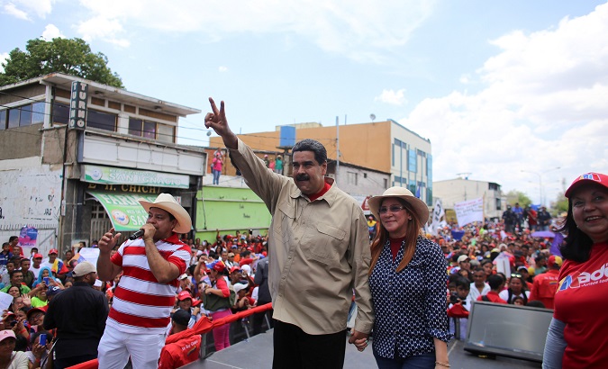 Venezuela's President Nicolas Maduro attends a campaign rally with his wife Cilia Flores in Carora.