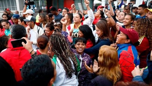 Supporters of Venezuelan President Nicolas Maduro celebrate during voting on Sunday.