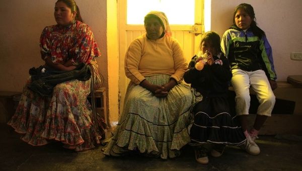 Raramuri people wait for medical attention in Carichi, Chihuahua, in Mexico in this file photo from January 2012.