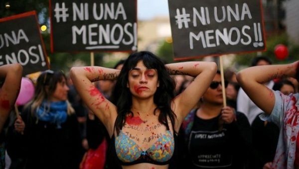 A women's march protesting the high levels of femicide endemic across Latin America.