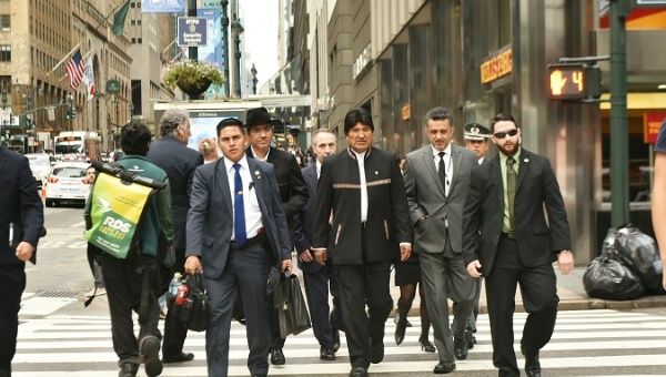 Bolivia's President Evo Morales (C) walk in Manhattan, New York.