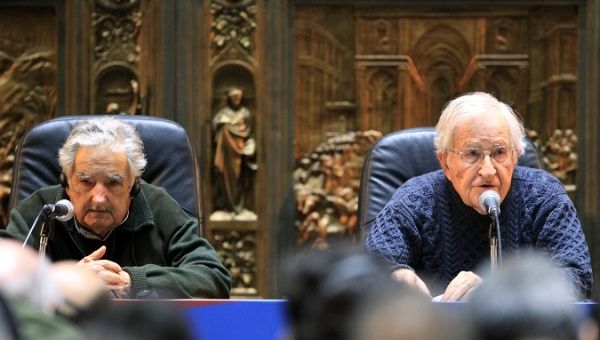 Noam Chomsky during a conference with former Uruguayan President Jose Mujica. 