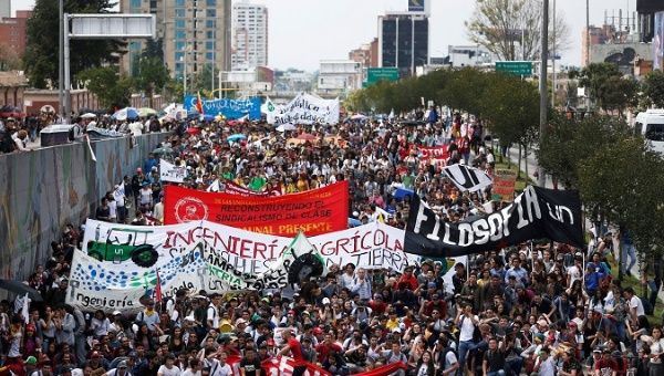 Students take part in a march during a demonstration in Bogota.