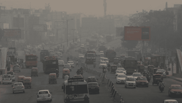 Vehicles drive through smog in New Delhi, India, November 8, 2018.