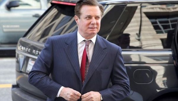 Former Trump campaign manager Paul Manafort arrives for arraignment on a third superseding indictment against him by Special Counsel Robert Mueller on charges of witness tampering.