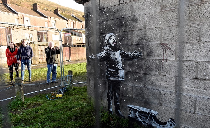 People view new Banksy image in Port Talbot
