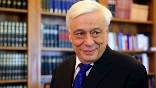 Greek President Prokopis Pavlopoulos hosted a ceremony to honor the three migrants.