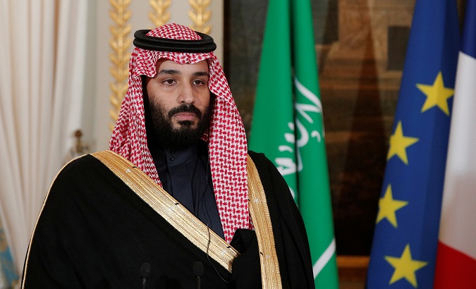 Saudi Arabia's Crown Prince Mohammed bin Salman attends a press conference with French President Emmanuel Macron.