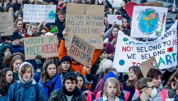 Belgian students protesting, to demand urgent measures to combat climate change, in Brussels.