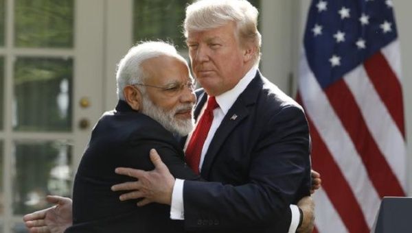 Prime Minister Narendra Modi hugs President Donald Trump as they give joint statements, June 2017.