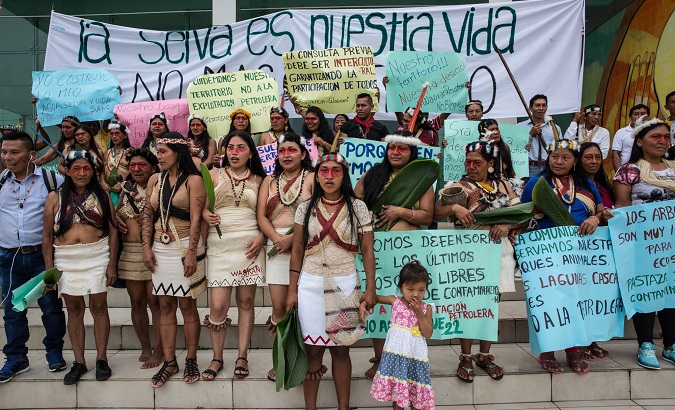 Waoranis protesting after not being being able to present their case at a public hearing on their land.