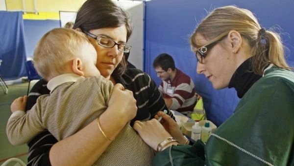 A child is vaccinated against H1N1 in Marseille, France. 