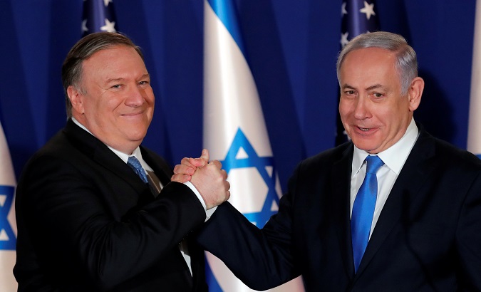 U.S. Secretary of State Mike Pompeo shake hands with Israeli Prime Minister Benjamin Netanyahu, during their visit at Netanyahu's official residence in Jerusalem