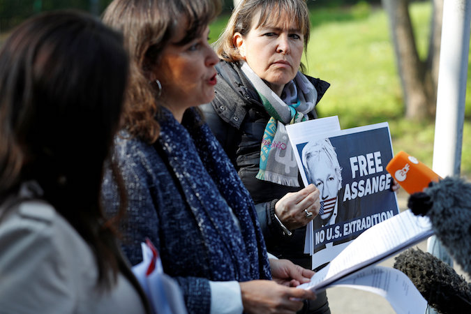 Spanish MEP Ana Miranda Paz and German MPs Sevim Dagdelen and Heike Haensel speak outside HMP Belmarsh prison about WikiLeaks founder Julian Assange in London, Britain April 15, 2019.