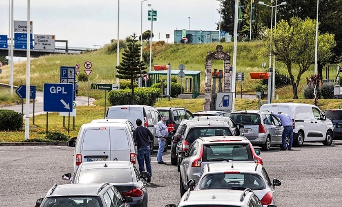 Panicked drivers queued for hours outside gas stations to fill up their tanks.