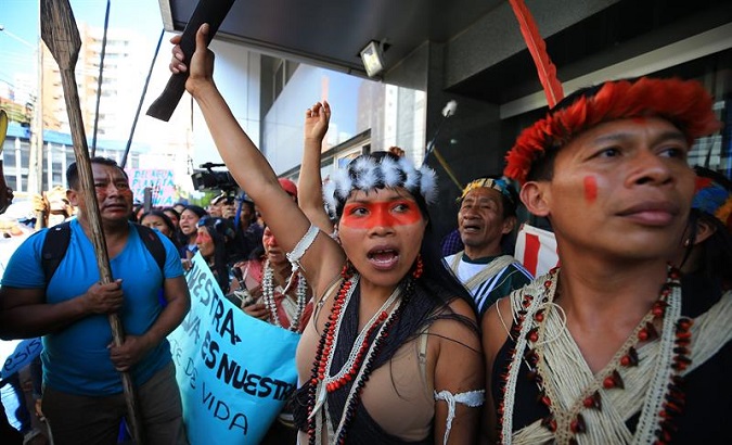 Members of the Waorani community march in Ecuador to demand the ratification of a ruling that denies their self-determination.