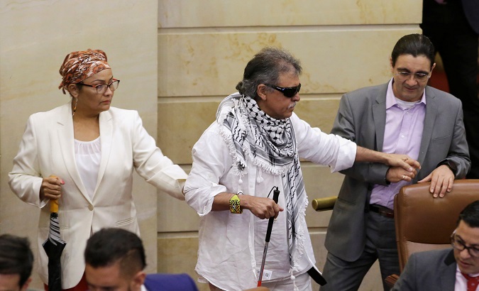 Jesus Santrich arrives to a plenary session for the first time as a lawmaker at the Congress in Bogota, Colombia June 12, 2019.
