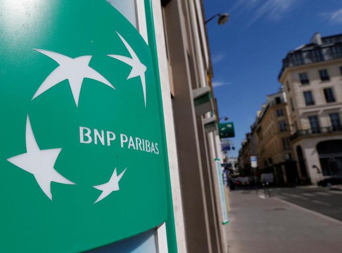 A BNP Paribas logo is seen outside a bank office in Paris, France, August 6, 2018.