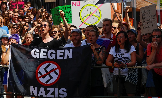 Germans protest against a far-right identitarian rally in Halle, Germany, July 20, 2019.