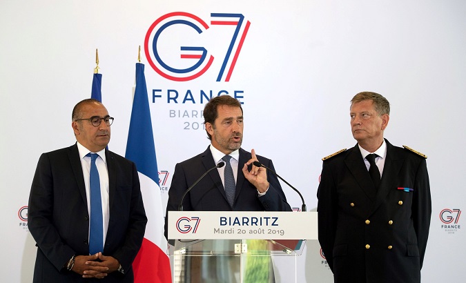 French Interior Minister Christophe Castaner (C), Pyrenees Atlantiques prefect Eric Spitz (R) and Secretary Laurent Nunez (L) in Biarritz, Basque Country, France, 20 August 2019.