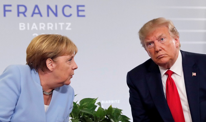 U.S. President Donald Trump meets German Chancellor Angela Merkel for bilateral talks during the G7 summit in Biarritz, France, August 26, 2019.