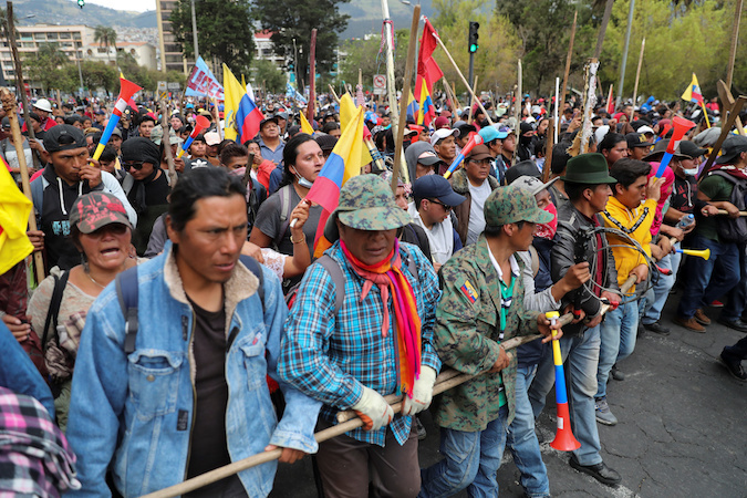 Demonstrators participate in a protest against Ecuador's President Lenin Moreno's austerity measures in Quito, Ecuador, October 8, 2019.