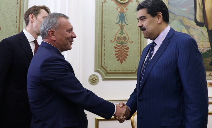 Russian Deputy Prime Minister Yuri Borisov and President Nicolas Maduro during a meeting in Caracas, Venezuela, Oct. 5, 2019.
