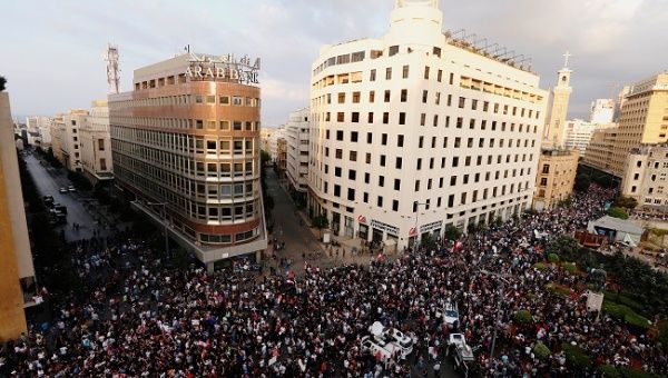 Demonstrators take part in an anti-government protest in Beirut, Lebanon October 19, 2019.