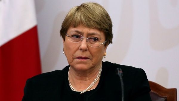 U.N.'s Bachelet looks on before signing an agreement on the provision of guidance and technical assistance in the Ayotzinapa case, in Mexico City.