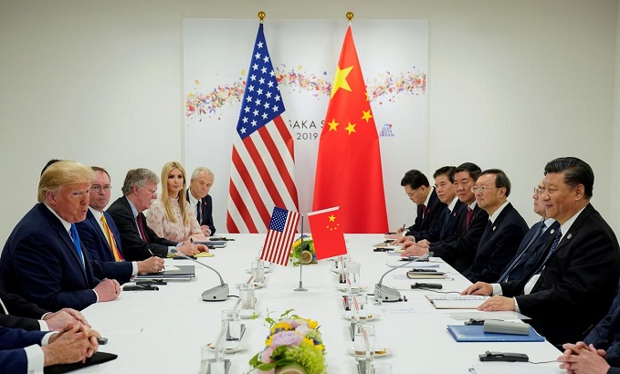 The agreement is expected to reduce fees and boost Chinese purchases of American agricultural, energy and manufactured products