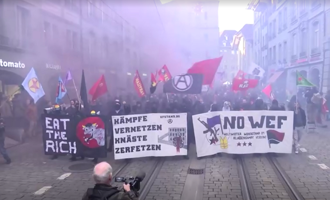 Anti-World Economic Forum protesters marching on Bern, Switzerland, Jan. 21, 2019.