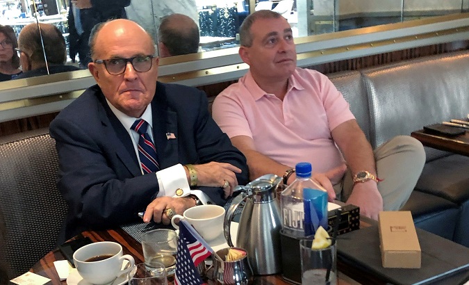 President Trump's personal lawyer Rudy Giuliani (L) and Ukrainian businessman Lev Parnas (R) at the Trump International Hotel in Washington, U.S. Sep. 20, 2019.