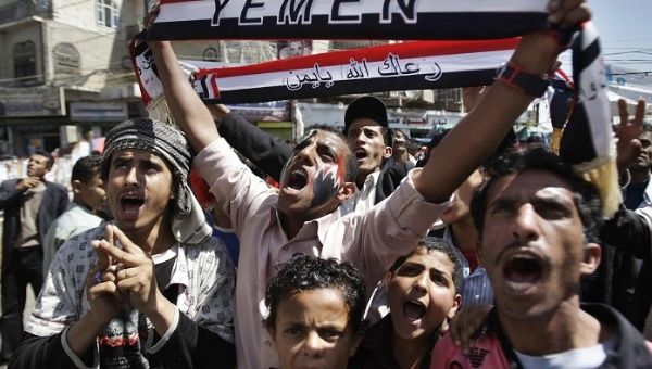 Yemeni civilians attend a demonstration in the capital city, Sanaa.