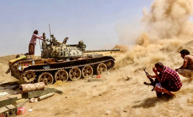 STC tank fires on frontlines of clashes with pro-government forces for control of Zinjibar in southern Yemen on May 16