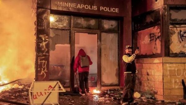 Protesters at the burnt-down Minneapolis Police Department, Minneapolis, Minnesota, U.S., May 28, 2020.
