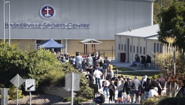 People arrive at a COVID-19 screening clinic at the Parklands Christian College in Brisbane, Australia, July 30, 2020. 