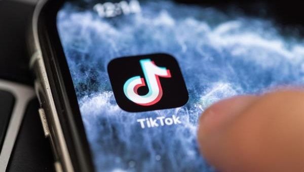 A close-up shows the video-sharing application TikTok on a smart phone. TikTok announced it would launch a court action over Donald Trump's plan to ban the app.