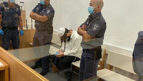 Jewish settler Amiram Ben-Uliel facing trial in Lod District Court for the arson attack an entire Palestinian family in Lod, Israel. May 18, 2020.