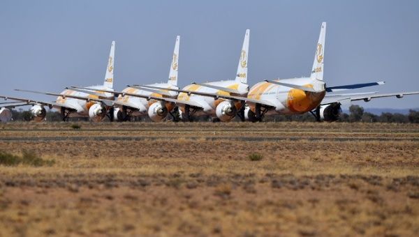  Boeing 787-8 Dreamliner airplanes of Singapore low-cost carrier Scoot Tigerair, grounded due to the Coronavirus (COVID-19) pandemic, are parked at the Asia Pacific Aircraft Storage facility in Alice Springs, Australia, 30 August 2020.