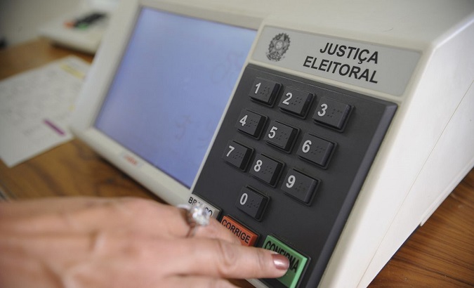 A woman votes electronically in elections Brazil elections, Sept. 24, 2018.