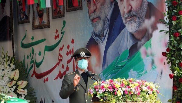A handout photo made available by the Iranian defence ministry office shows Iranian Defence Minister Amir Hatami delivering a speech during funeral of slain Iranian nuclear scientist Mohsen Fakhrizadeh in Tehran, Iran, 30 November 2020. 