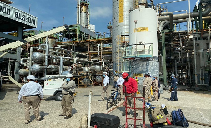 Workers at Salamanca's refinery, Guanajuato, Mexico, Jul. 15, 2020.