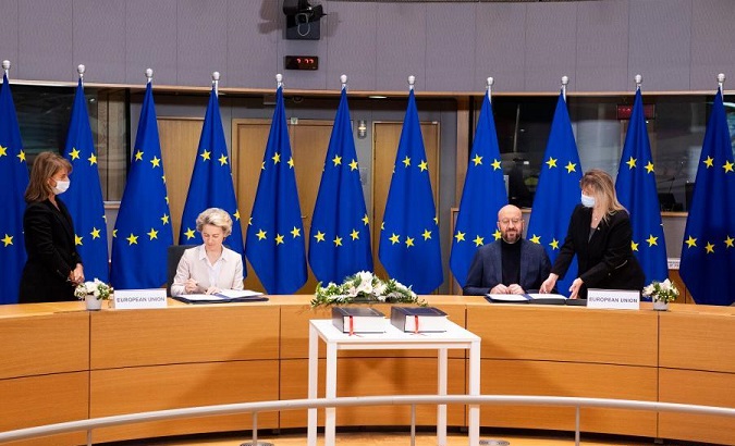 EU Council President Charles Michel (2nd R) and European Commission President Ursula von der Leyen (2nd L) attend a signing ceremony, Brussels, Belgium, Dec. 30, 2020.
