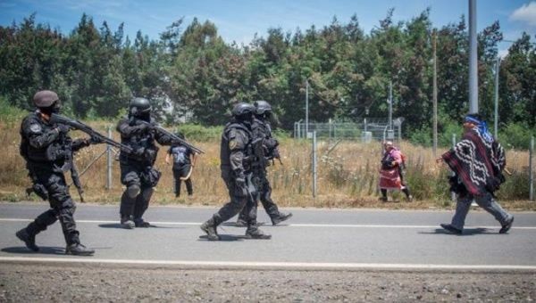 Police officers carry out an operation in Mapuche communities, Araucania, Chile, Jan. 7, 2021.
