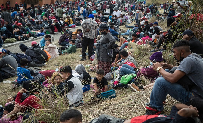Honduran migrants rest on a road, Chiquimula, Guatemala, Jan. 17, 2021.