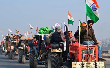 Farmers carry out a tractor rally on January 26 in Delhi, India.